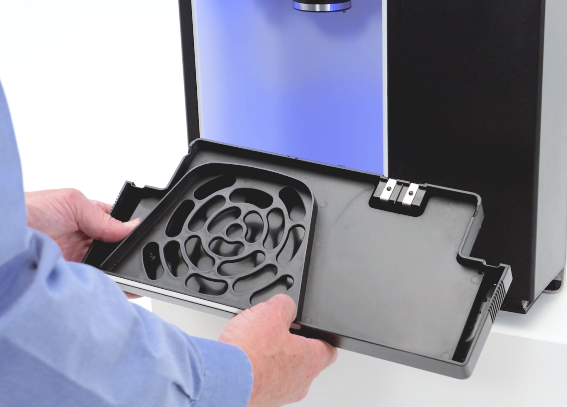 close up of Champion drip tray being removed